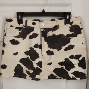 Le Lis Black and Cream Cow Pattern Mini Skirt